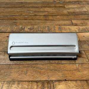 Franklin Covey Classic 7-Hole Metal Paper Punch Gray 7.5 in